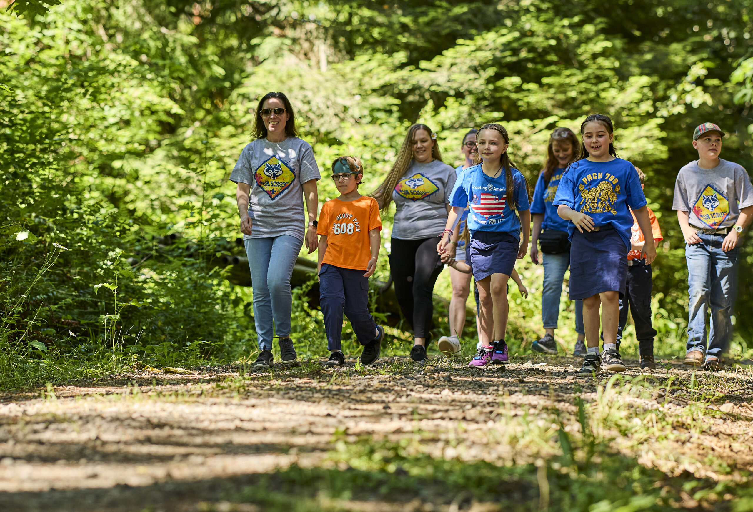 Cub Scouts hiking on a trail